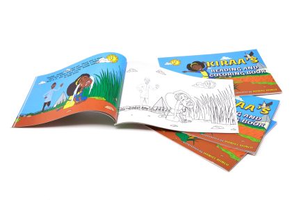 Open pages of Kiraa’s Reading and Coloring Book